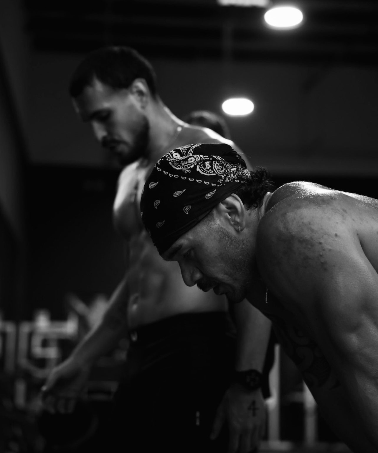 Athletes catching their breath between sets at Raw Performance